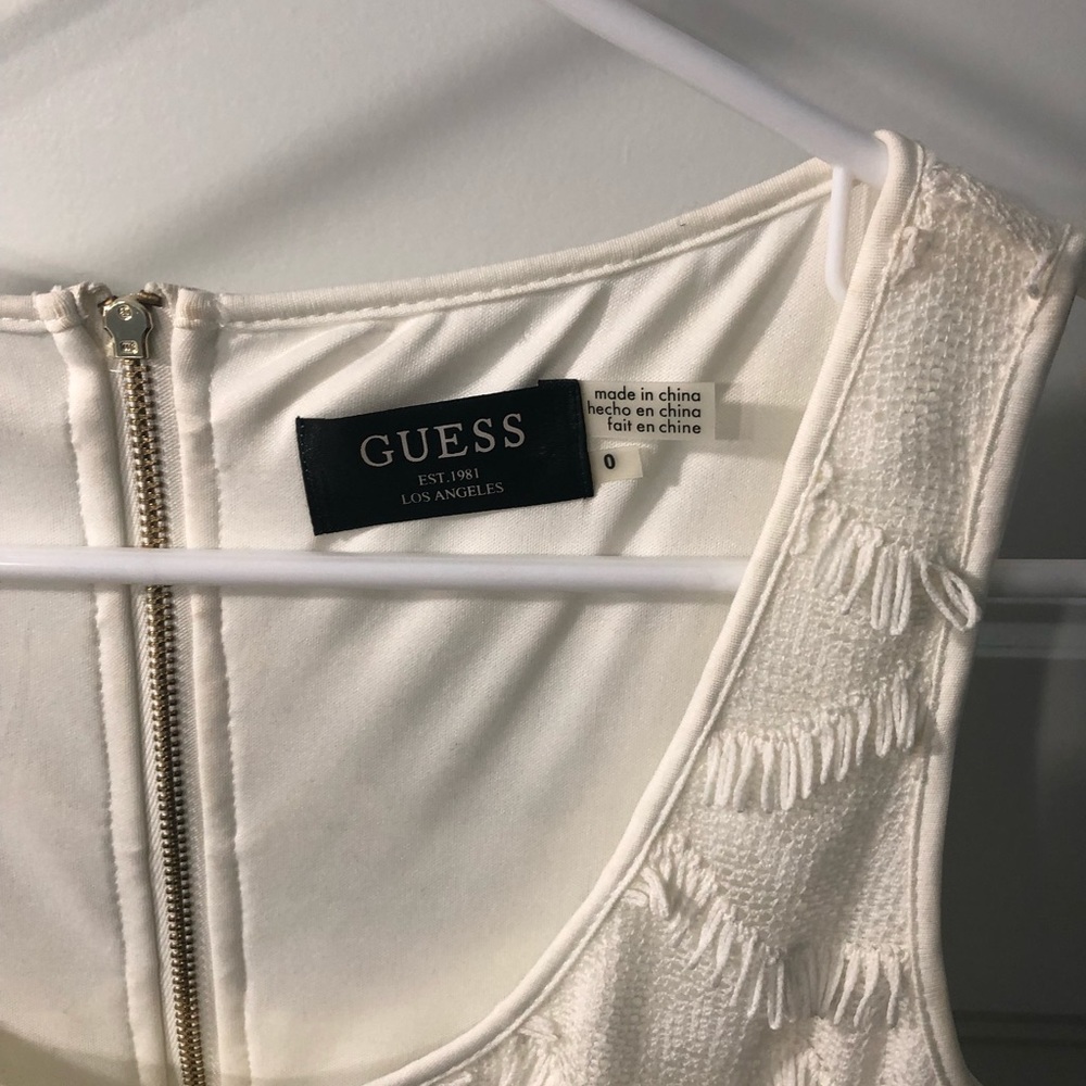 Off white fringe dress, sleeve less. Never worn.